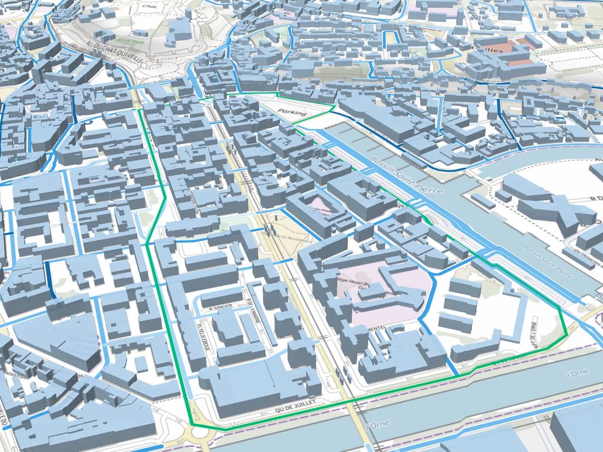 Maquette 3D du cadastre du quartier Saint-Jean à Caen : les bâtiments en volume avec leurs hauteurs réelles, les rues coloriées par prix
